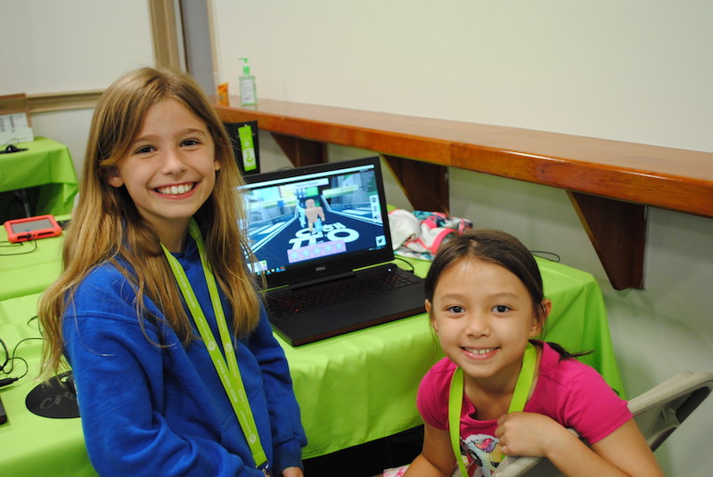 two girl minecraft campers smiling